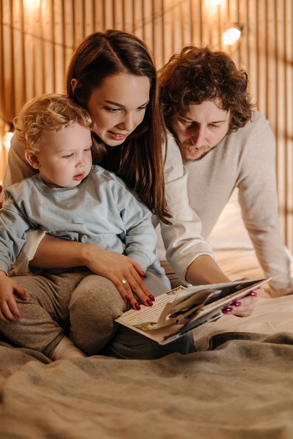 Family Reading a Book